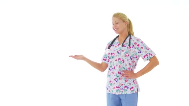 Female Nurse Holding Out Hand Text — Stock Video