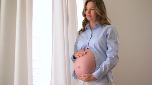 Expecting Mother Standing Window — Stock Video