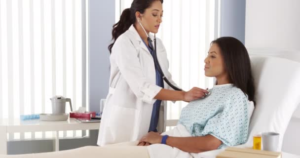 Hispanic Female Doctor Listening Patient Stethoscope — Stock Video