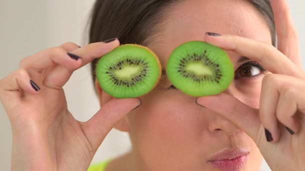 Happy Smiling Woman Making Silly Faces Fruit Eyes — Stock Video