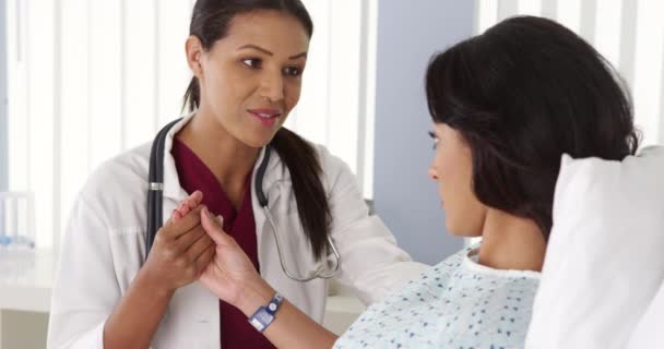 African American Doctor Sitting Patient Bed Holding Hands — Stock Video