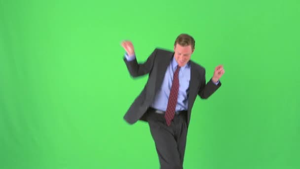 在绿屏上跳舞的商人 — 图库视频影像