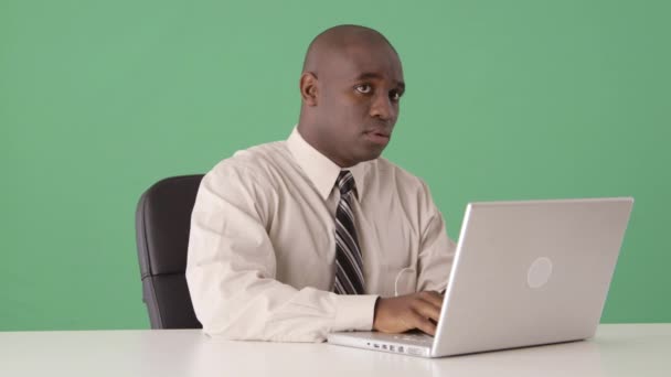 African American Businessman Secretly Listening Music Desk — Stock Video