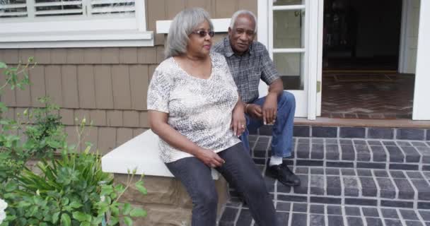 Happy Senior Black Couple Talking Sitting Porch — Stock Video