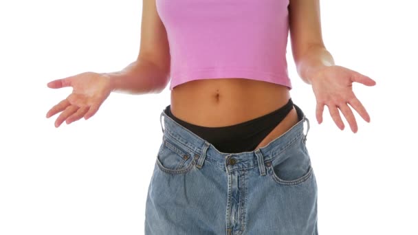 Frau Zeigt Gewichtsverlust Baggy Jeans — Stockvideo