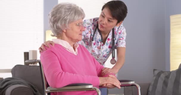 Elderly Patient Talking Caring Asian Nurse — Stock Video