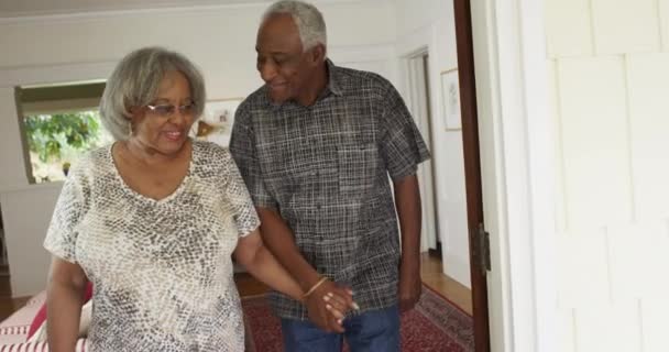 Sweet Black Senior Couple Walking Couch Smiling — Stock Video