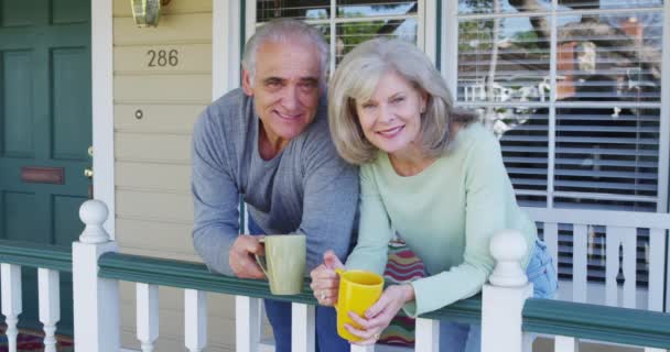 Mature Couple Porch Smiling — Stock Video