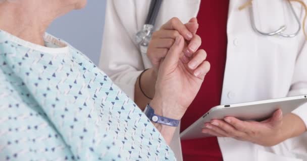 Doctor Holding Hand Mature Woman Hospital Bed — Stock Video