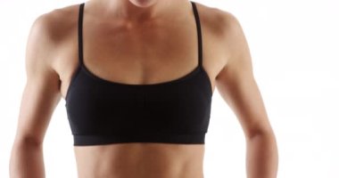 Sağlıklı melez kadın, bel ölçer, gülümser.