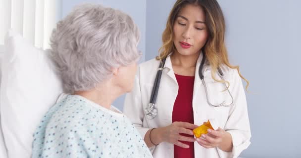 Japanese Physician Talking Elderly Woman New Prescription — Stock Video