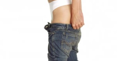 Seksi Asyalı kadının kot pantolon giydiği yakın plan.