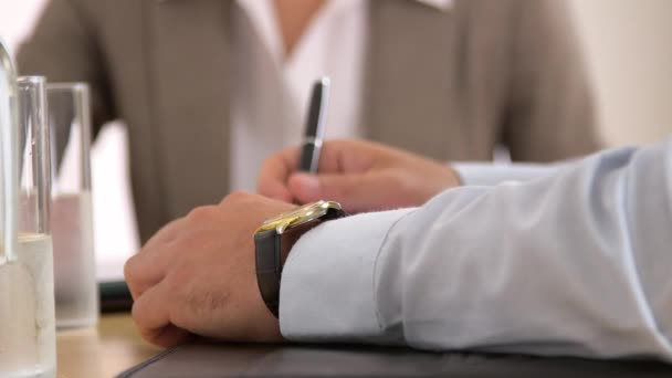 Businessman Checking His Watch Meeting — Stock Video