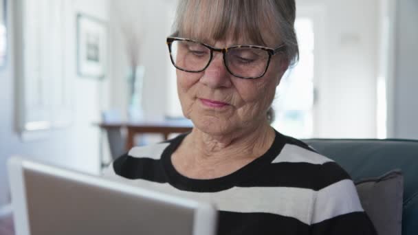 Close Senior White Woman Using Tablet Computer While Sitting Living — Stock Video