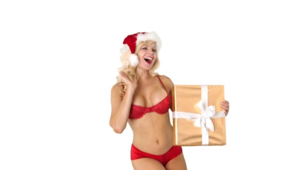 Сексуальная Молодая Девушка Шляпе Санта Клауса Подарками Распухшими Поцелуями — стоковое видео