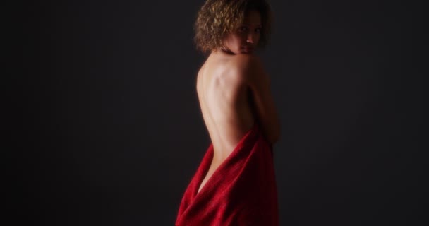 Rear View Nude African Woman Holding Red Cloth — Stock Video