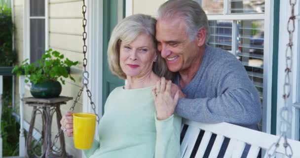 Sweet Mature Couple Relaxing Porch Talking — Stock Video