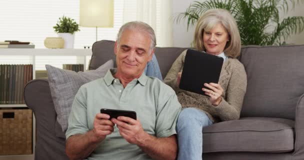 Senior Couple Using Tablet Computer Smartphone — Stock Video