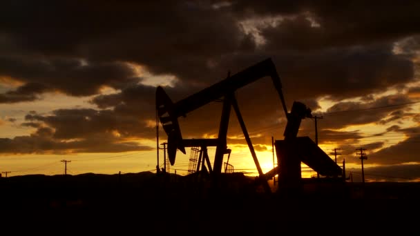 Oil Well Piston Pumps Sunset — Stock Video