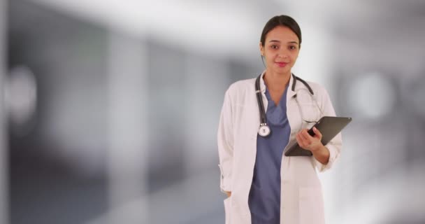 Mexican Woman Doctor Smiling Holding Tablet — Stock Video