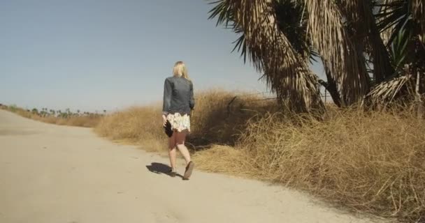 Caucasian Hipster Girl Walking Dirt Trail — Stock Video