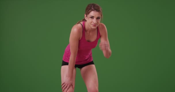 Young Woman Catching Her Breath Running Cross Country Green Screen — Stock Video