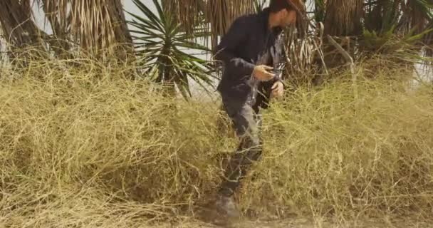 Attractive Hispanic Man Finds Place Sit Use Smartphone — Stock Video