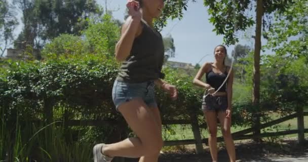 Women Having Fun Park Jumping Rope — Stock Video