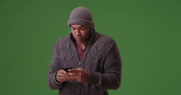 African American Man Stands Trembling His Smart Phone Green Screen — Stock Video