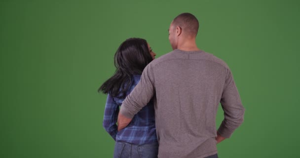 African American Couple Holding Hands Looking Out Distance Green Screen — Stock Video