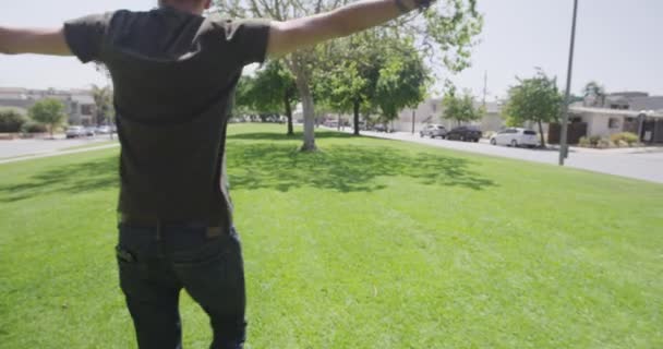 Hispanic Man Embracing Two Multi Ethinic Friends Walking Park — Stock Video