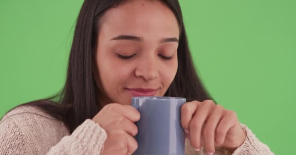 Millennial Latina Girl Smiles While She Thinks Her Hot Tea — Stock Video