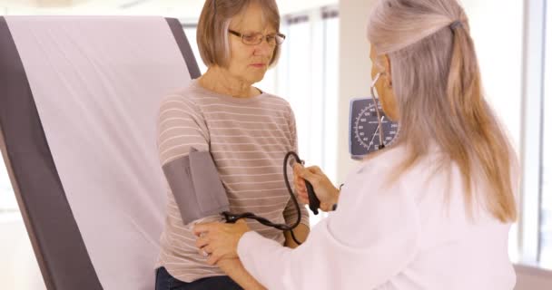 Elderly Patient Gets Her Blood Pressure Checked Her Doctor Older — Stock Video