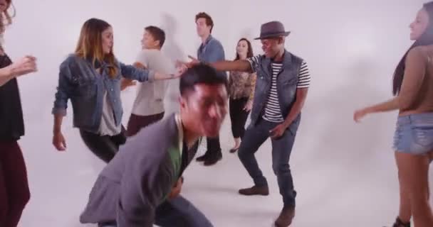 Mixed Race Group Friends Doing Limbo Dance Party White Studio — Stock Video