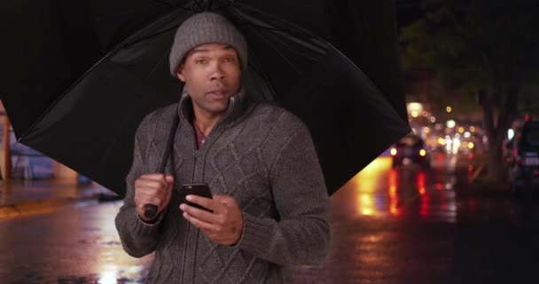Black Man Stands Rainy Street Umbrella African American Guy Uses — Stock Video