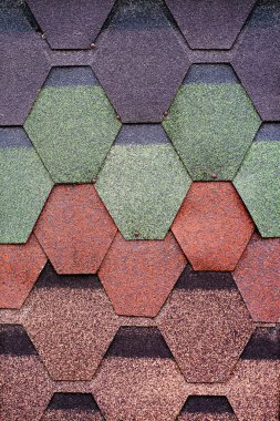 Arka plan, örnekler, çok renkli esnek, evin çatısını kaplayacak yumuşak fayanslar. İnşaat malzemesi