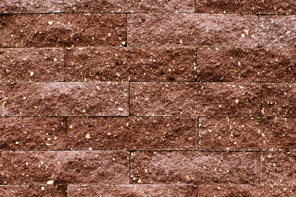 Achtergrond Een Muur Van Bruine Bakstenen Met Een Reliëf Textuur — Stockfoto