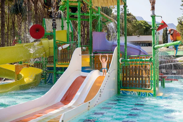 Cute Little Boy Rolls Water Slide Aquapark Activities Pool Concept — Stock Photo, Image