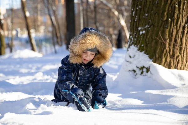 Cute Smiling Boy Hat Hood Fur Plays Snow Having Fun — Stock Photo, Image