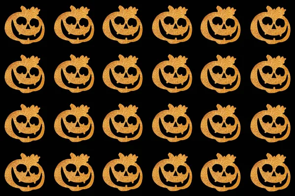 Seamless Halloween pattern. Pumpkin face on a black background. Top view — Stock Photo, Image