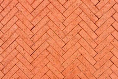 Kaldırımda ya da kaldırımda kırmızı tuğlalı kaldırım taşları. Üst görünüm, alanı kopyala