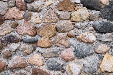 Eski kaldırım taşı duvar. Mükemmel bir arkaplan. Boşluğu kopyala