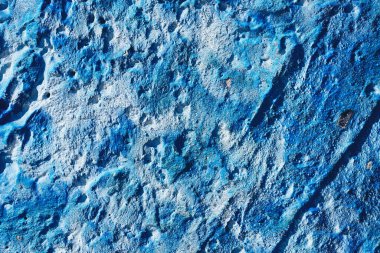 Blue concrete wall texture. Copy space for text, top view