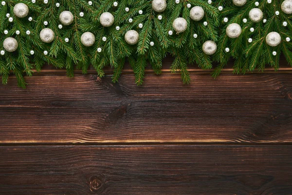 Christmas Background Christmas Decoration Fir Tree Branches Dark Wooden Background — Stock fotografie