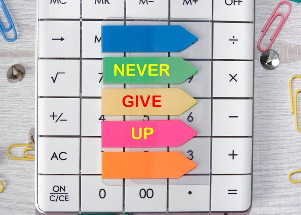 Never Give Text Written Stickers Calculator — Stock Photo, Image