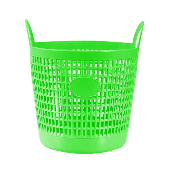 白色背景上隔离的绿色小塑料篮子 — 图库照片