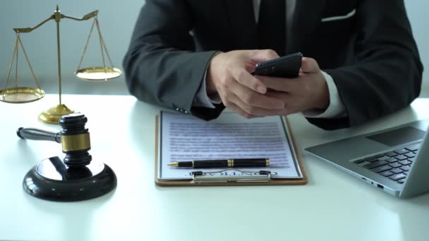 Asian Male Lawyer Using Smartphone Consult Clients Office Wooden Hammers — Stock Video