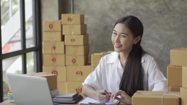 Business Woman Writing Address Shipping Customer Check Stock Taking Notes — Αρχείο Βίντεο