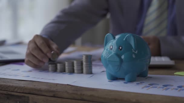 Man Using Calculator His Money Account Putting Coins Mug Business — Stockvideo