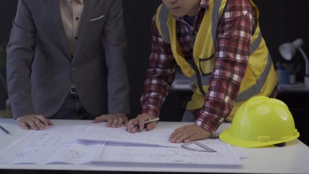 Team Designers Works Sitting Desk Office Employees Seriously Discuss Blueprints — Vídeo de Stock